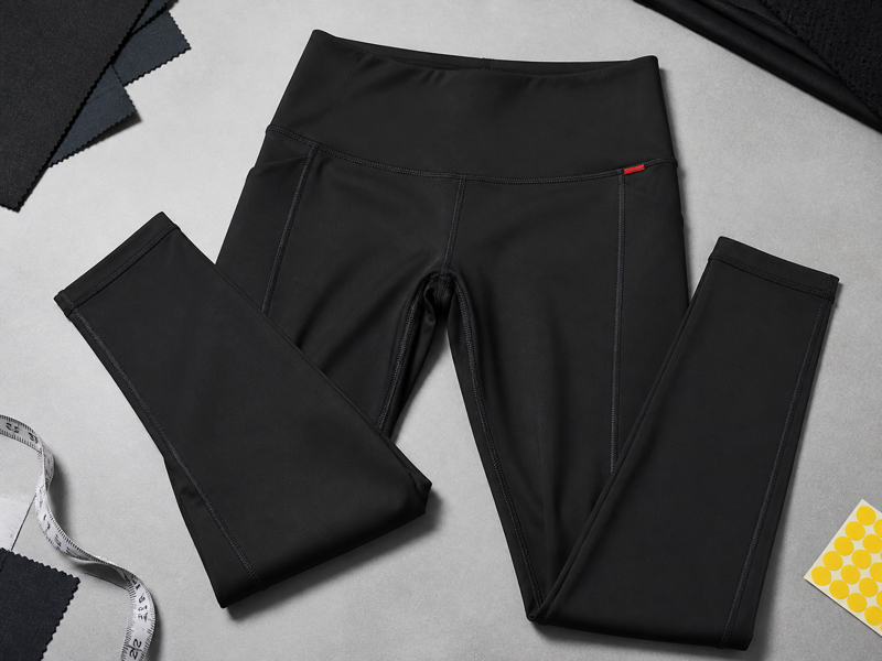 Black performance leggings with cross-grain stretch texture